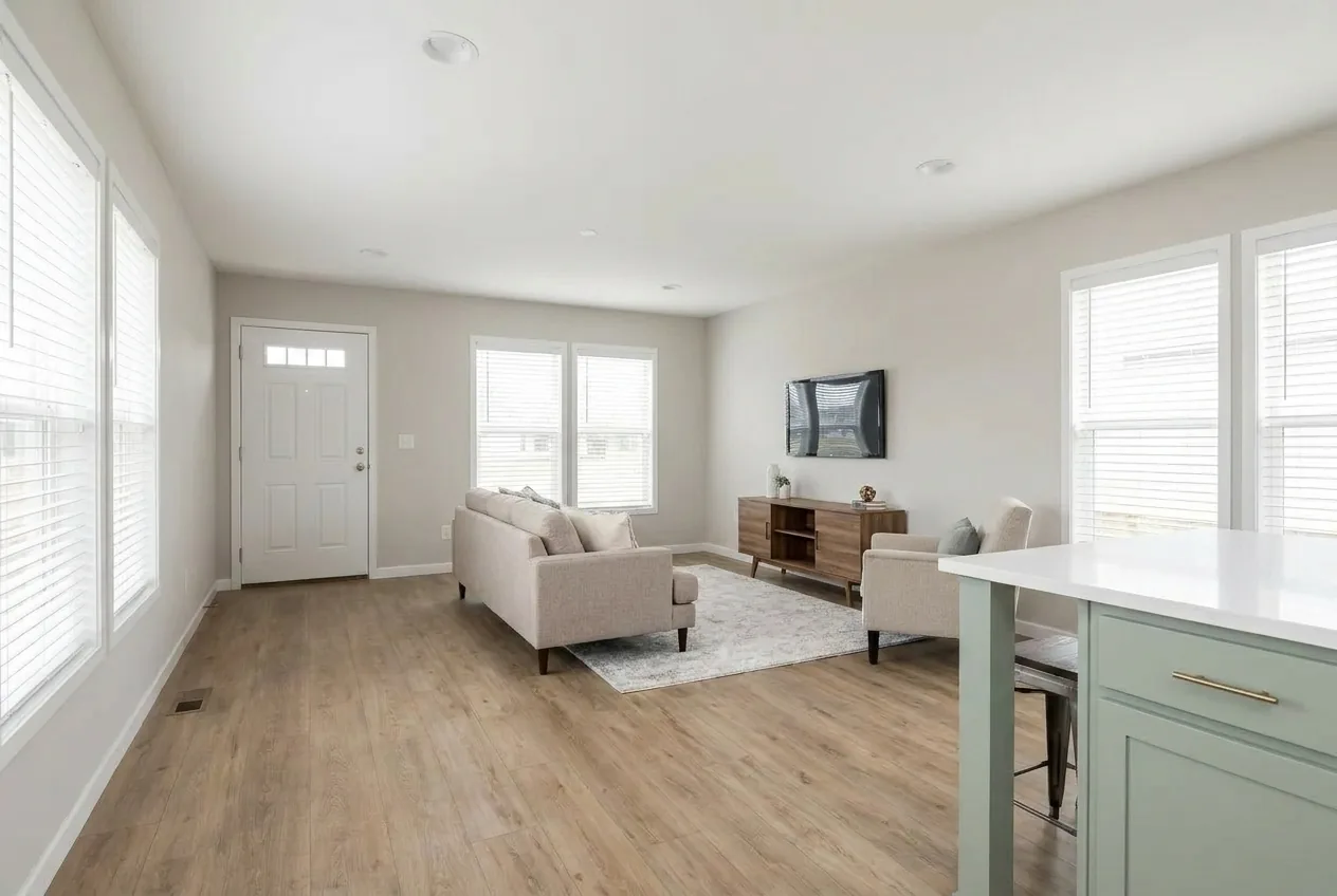 Illustration of the living room in the Pure 14663M (finishes and options may vary)